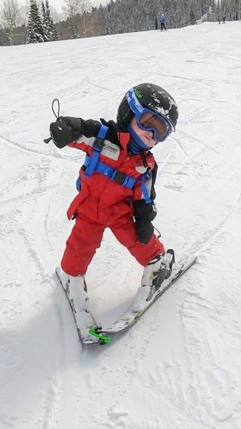 toddler skiing alone