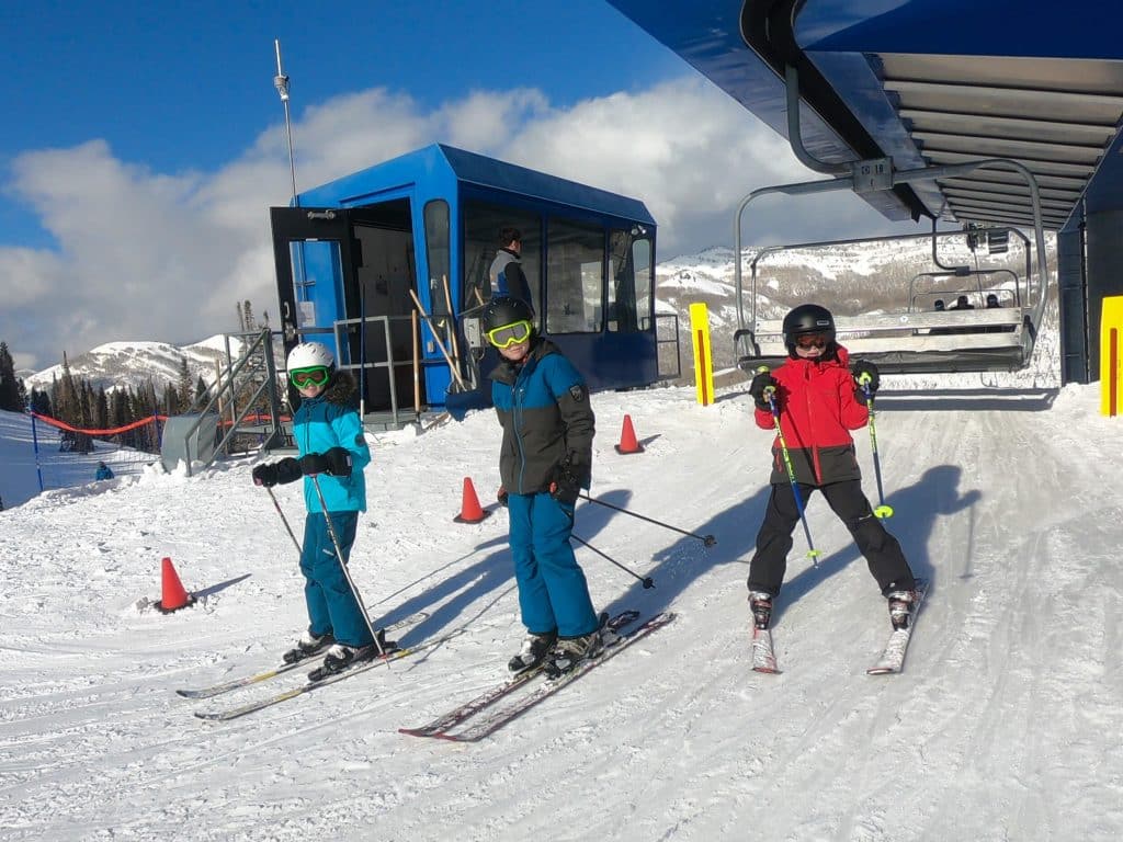 kids getting off chairlift