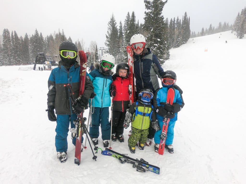 Family putting on skis