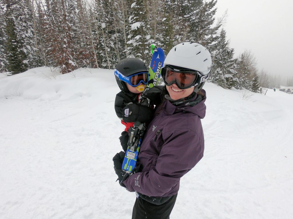 Mom and baby skiing