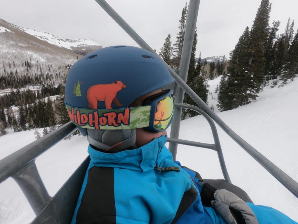 Boy wearing ski helmet