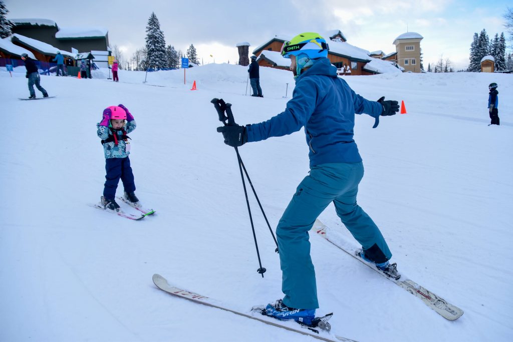 little girl learning how to ski