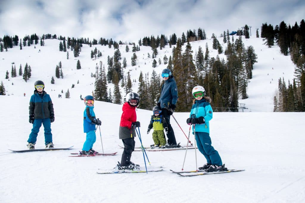 Family skiing at a resort