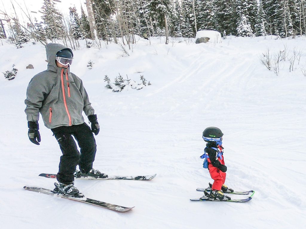 kids skiing for free at ski resort