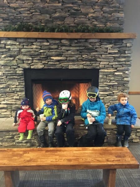 hot chocolate break while skiing with babies, toddlers, and kids