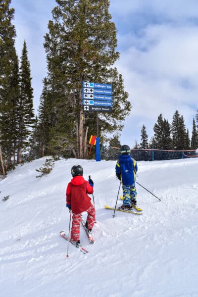 stopping on the side of the trail on skis