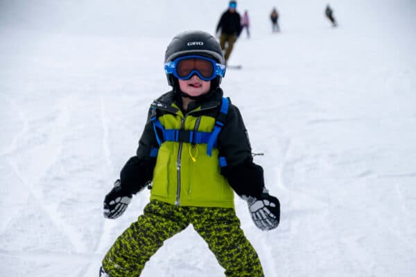 skiing toddler smiling