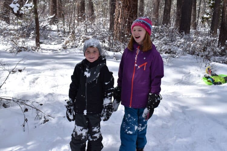 kids playing in the snow