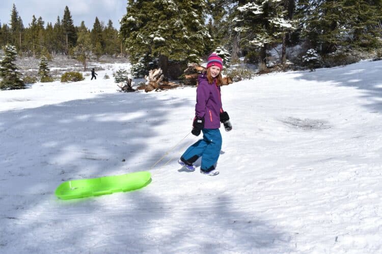 Girl Sledding