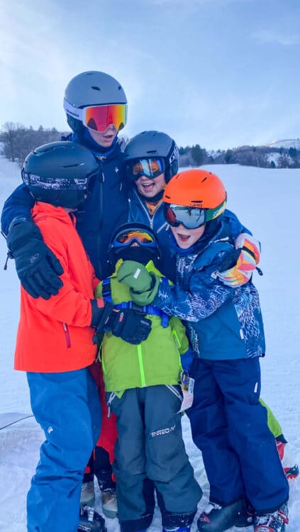 family skiing together at Park City