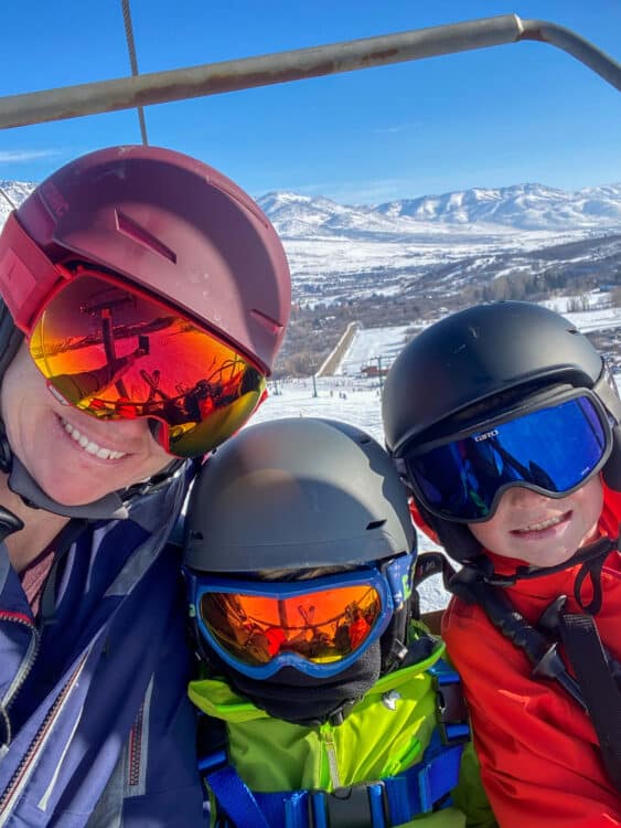 family wearing ski goggles