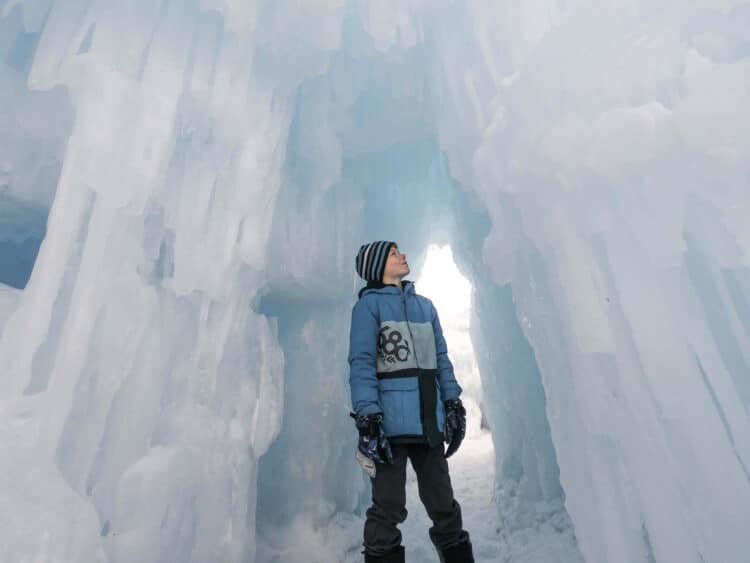 boy wearing hat at Ice castle