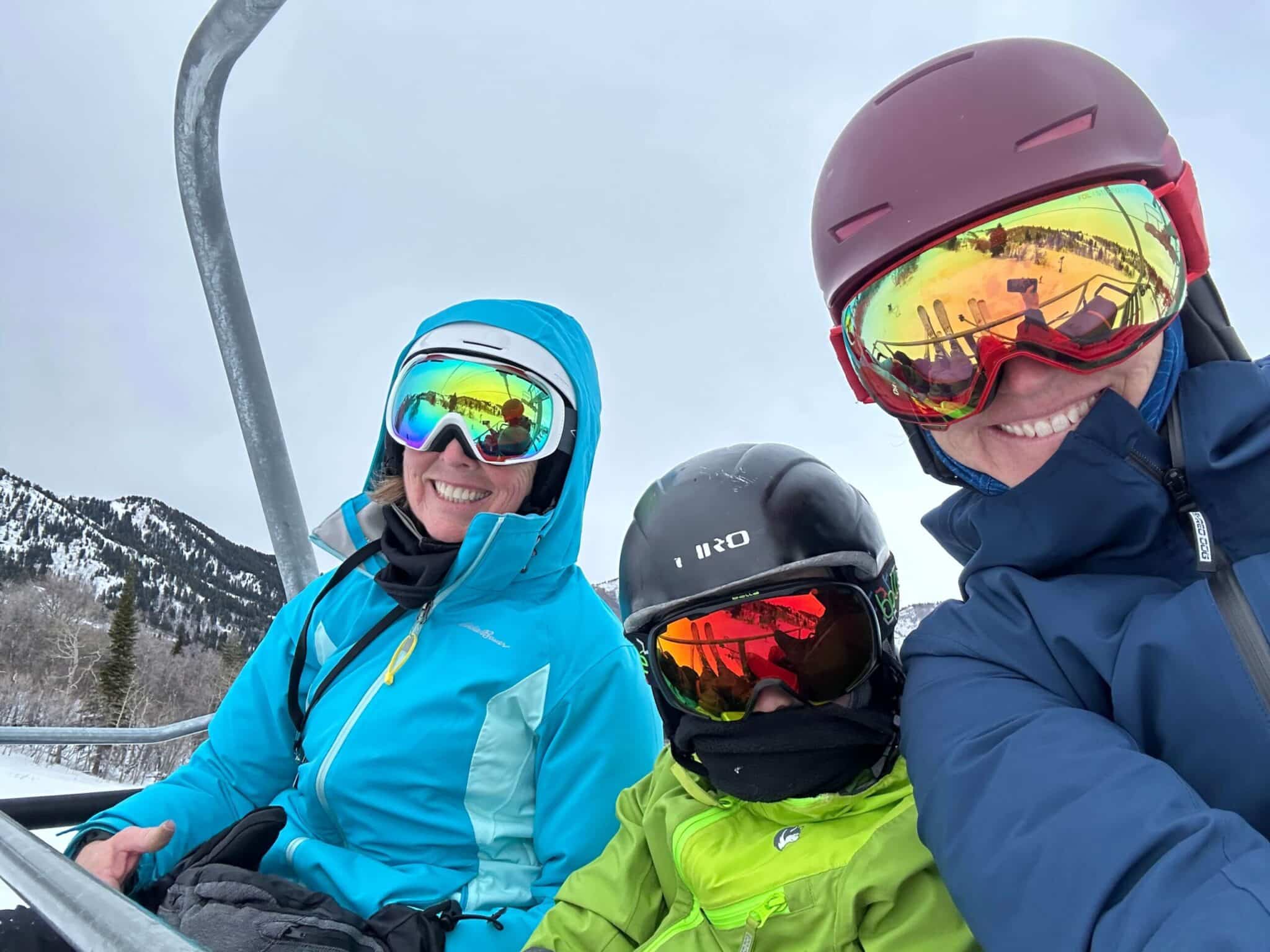 family skiing chairlift