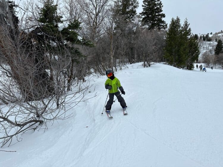 little boy skiing snowbasin