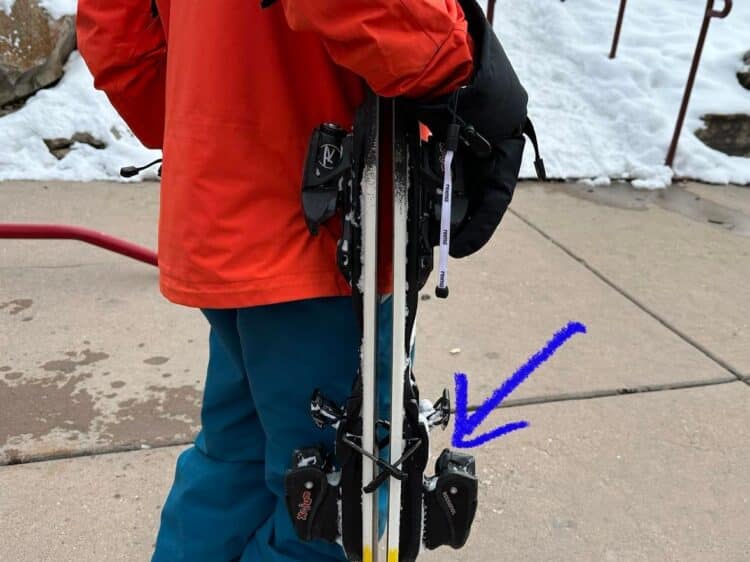 carrying skis upright