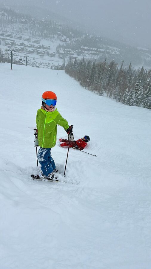 family skiing at brianhead utah powder day